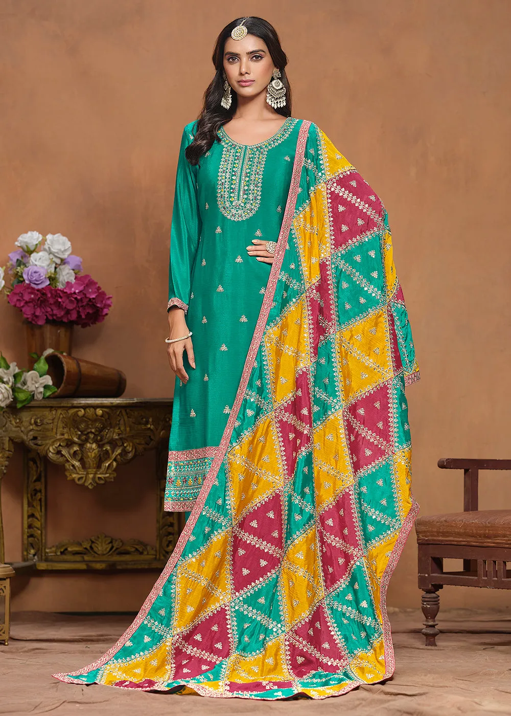 Chinnon Silk Turquoise Salwar Suit with Triangular Patch Dupatta