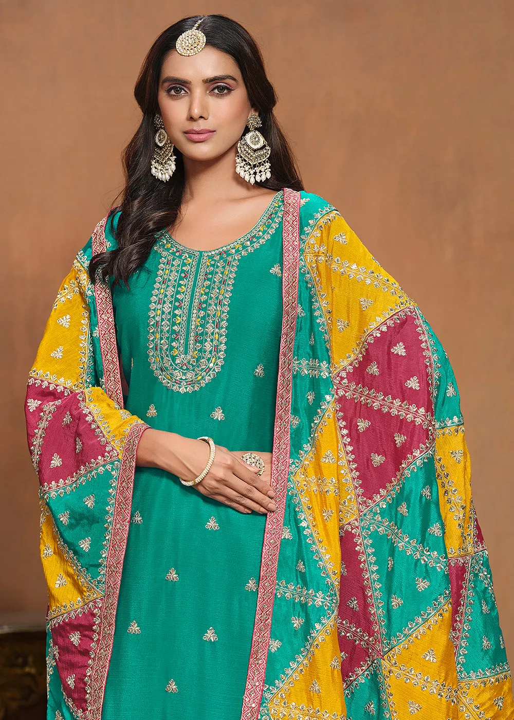 Chinnon Silk Turquoise Salwar Suit with Triangular Patch Dupatta